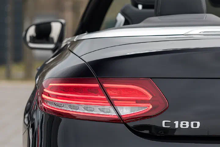 Rear light of a Mercedes-Benz C-Klasse Cabrio at car dealer Beresa in Münster, North Rhine-Westphalia, Germany