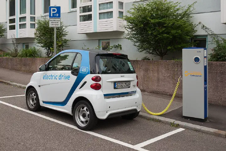 EnBW electric car charging station in Stuttgart with a 3rd generation Smart electric car of carsharing company Car2Go