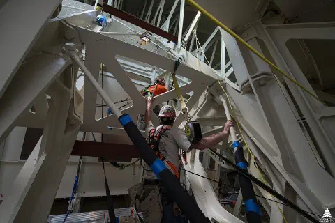 Placing protective canopy within the Capitol Rotunda during the Capitol Dome Restoration