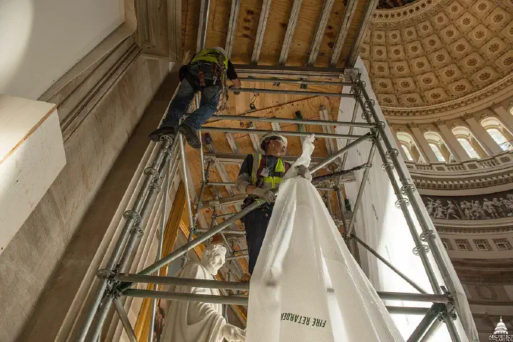 Placing protective canopy within the Capitol Rotunda during the Capitol Dome Restoration