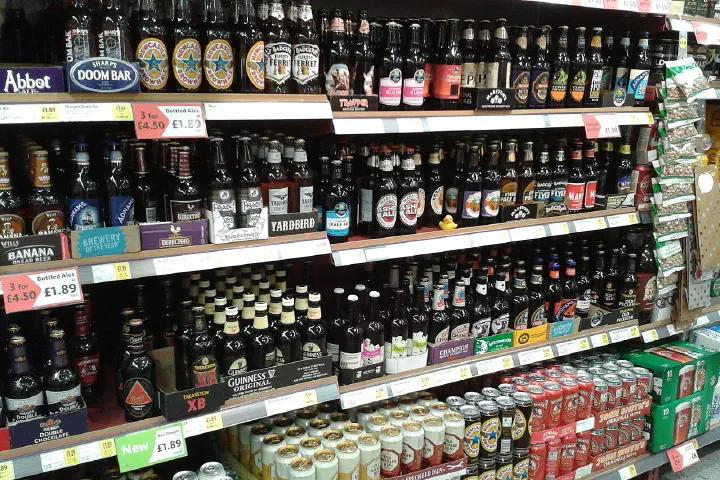 Shelves of beer at a Morrisons supermarket on October 2, 2013