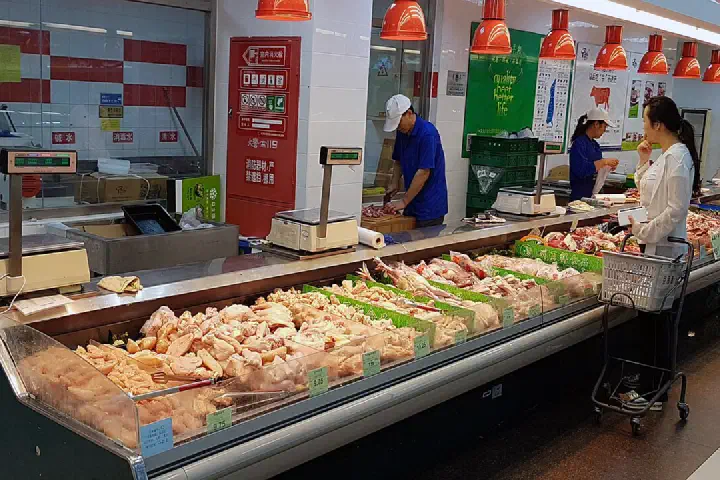 Meat counter at Dinkelong Supermarket in TuanJieHu, Beijing, China