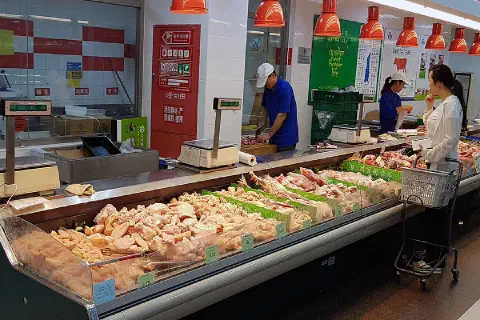Meat counter at Dinkelong Supermarket in TuanJieHu, Beijing, China