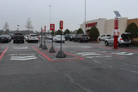 Target Dirve Up lanes with a grey SUV awaiting delivery from the store, Valdosta, Lowndes County, Georgia