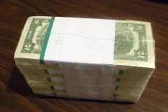 A thousand U.S. two-dollar bills in shrink wrap.