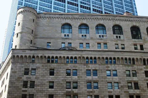 The Federal Reserve Bank of New York Building at 33 Liberty Street and occupying the full block between Liberty