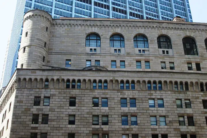 The Federal Reserve Bank of New York Building at 33 Liberty Street and occupying the full block between Liberty