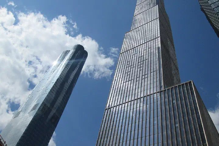 The Hudson Yards development in New York City in March 2019; looking up from 33rd Street at 15 (left) and 35 (center right) Hudson Yards. 55 HY is at