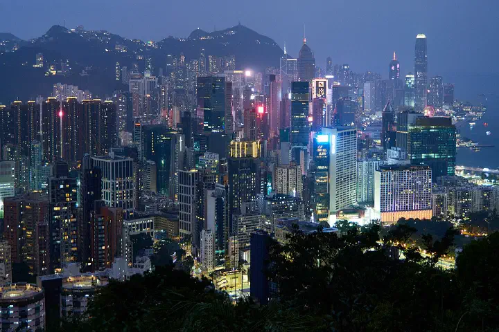 The Hong Kong Island skyline and Victoria Harbour viewed from an elevated vantage point at night