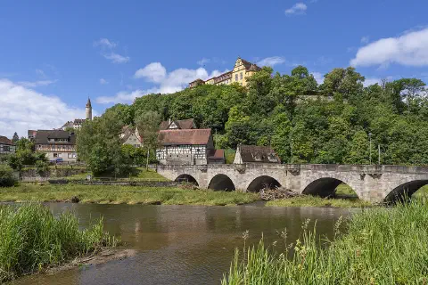 Kirchberg an der Jagst, Germany: view of the river Jagst with the listed stone-arch bridge