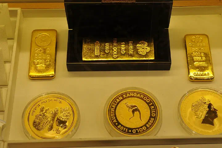 Goldmünzen + Goldbarren
