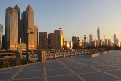 The Abu Dhabi skyline at sunset.