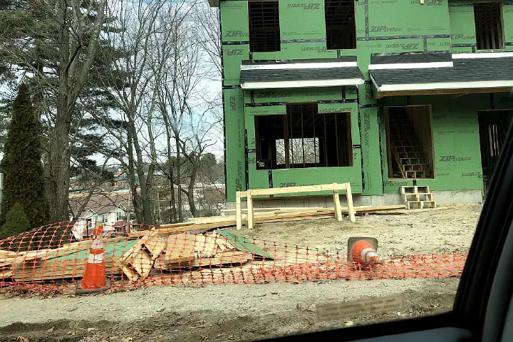 New construction framing and sheathing underway on a new construction on Gayland Rd