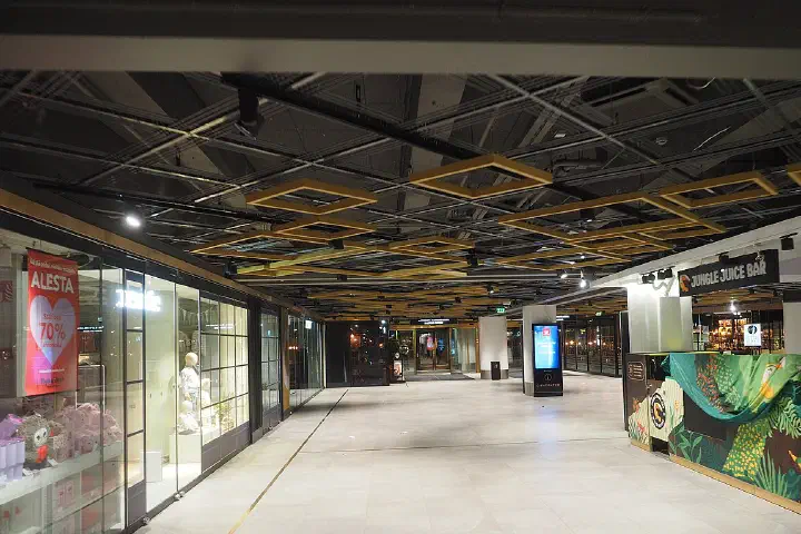 Interior of the City-Center shopping centre in central Helsinki, Finland empty of people on a night in January 2025