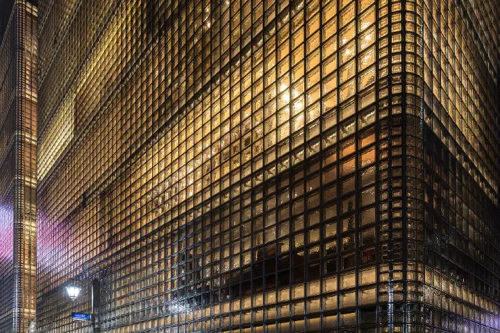 The illuminated Maison Hermès building in Ginza, Tokyo