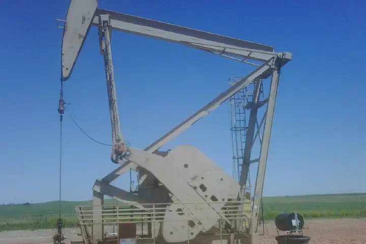 Brad's oil well pumping oil