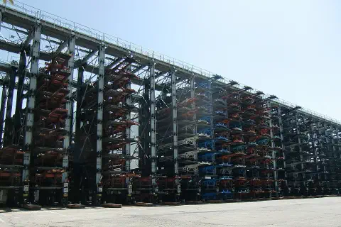 A stacking tower for container chassis