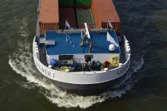 Men working on dutch cargo ship SJOUWER I. Photo taken 2019 on the Rhine near Cologne
