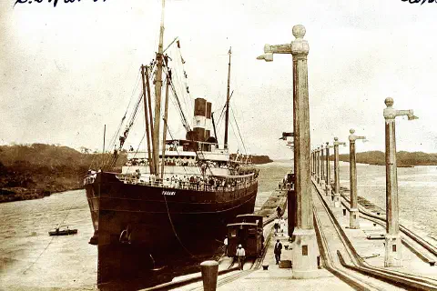 These are photos and photo postcards of an early crossing of the Panama Canal