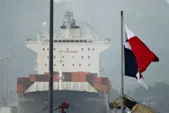 A container ship enters the Miraflores Locks on the Panama Canal.