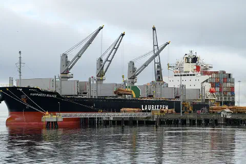 Lauritzen bulk carrier, Happiness Bulker - IMO 9919515, MMSI 538010308; self-loading raw logs at the dock in Port Angeles Harbor, Washington, USA