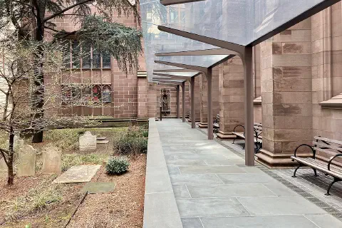 Modern steel and glass canopy on the south terrace of Trinity Church Wall Street, Manhattan, New York, designed by MBB Architects