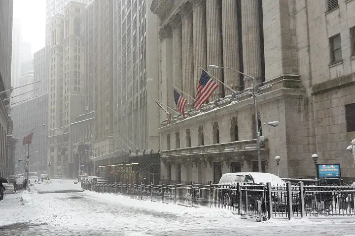 Broad St at Wall St, in front of New York Stock Exchange, during a snowstorm on February 9, 2017